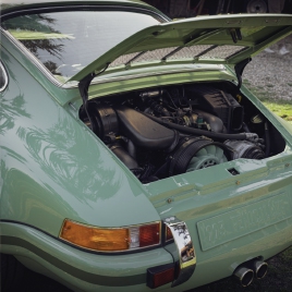 Why doeas the Porsche 911 have a rear engine?